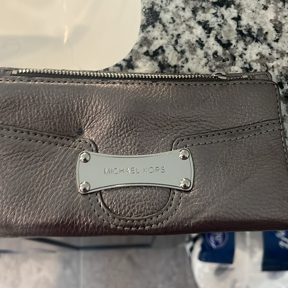 Michael Kors Tri-fold wallet. Good condition